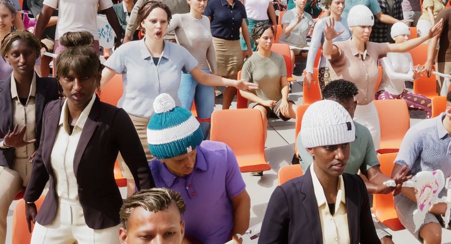 Seated spectators reacting