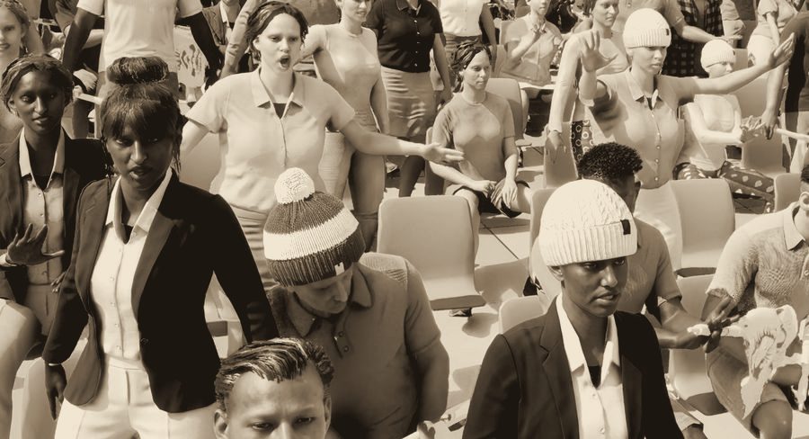 Seated spectators reacting